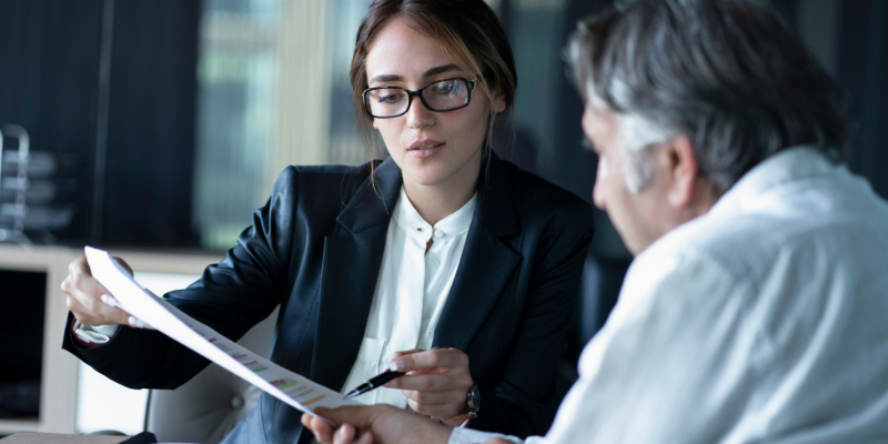 Lawyer working with a client.